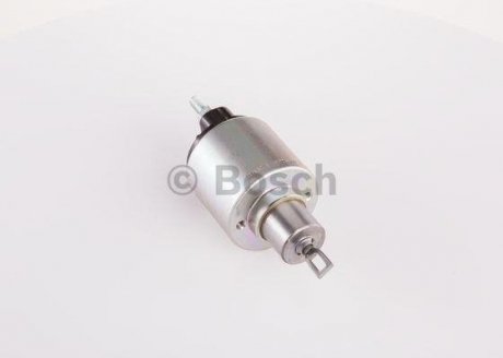 ВТЯГИВАЮЩЕЕ РЕЛЕ Bosch F000CD1140 (фото 1)